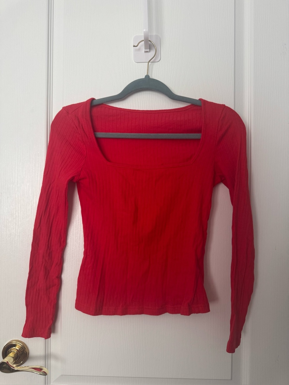 red long sleeve top